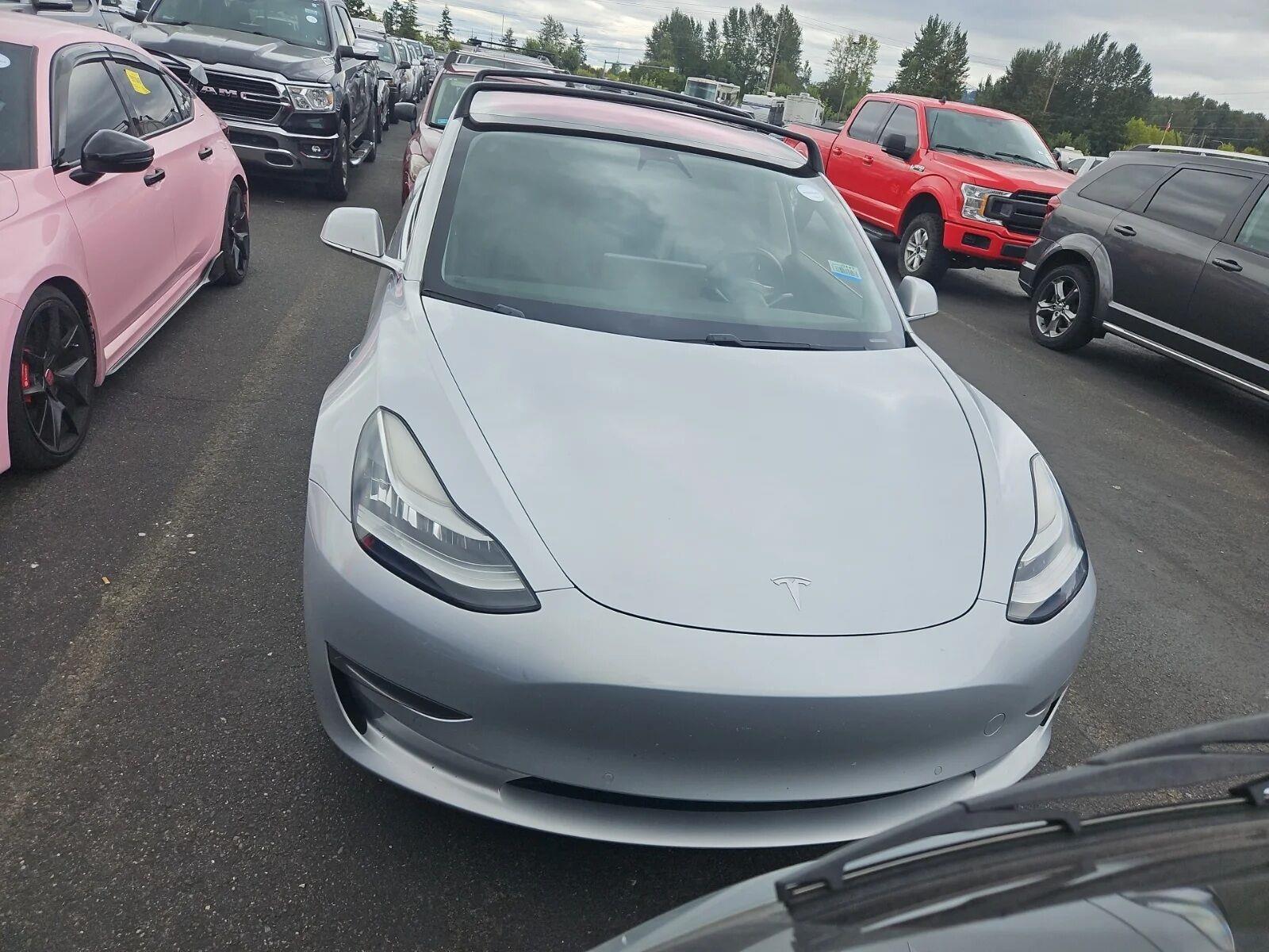 tesla model 3 2018 5YJ3E1EAXJF006106 image tesla model 3 2018 5YJ3E1EAXJF006106 image